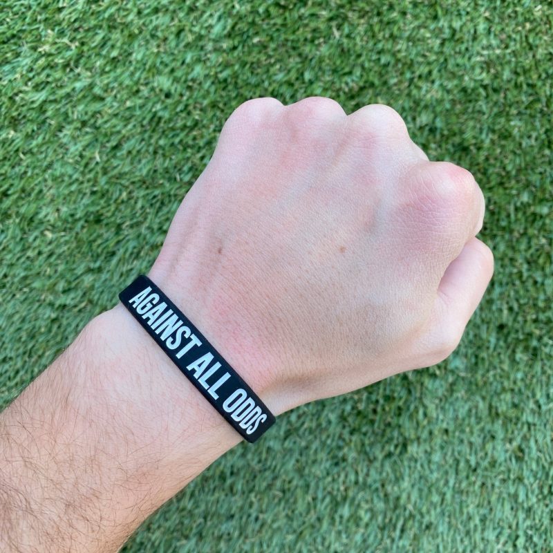 against all odds wristband 173399